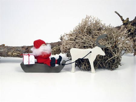 Tomte med ren och släde